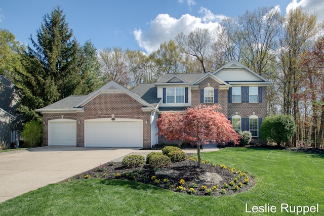 view of front of house with a garage, concrete driveway, brick siding, and a front yard