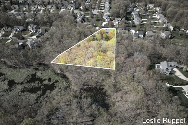 aerial perspective of suburban area with property parcel outlined