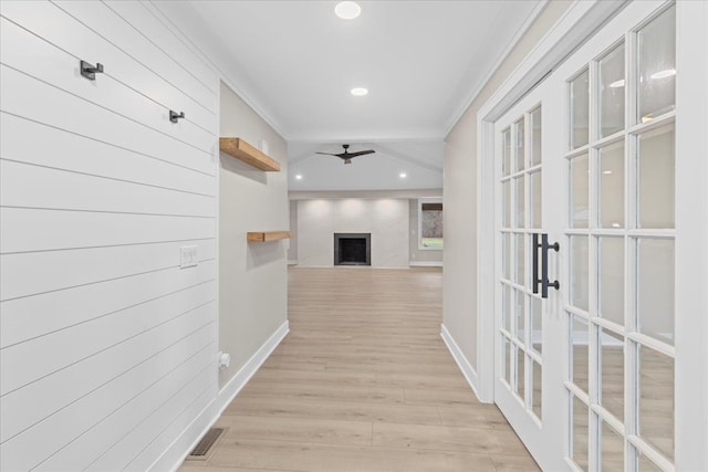 hall with french doors, light wood-type flooring, ornamental molding, recessed lighting, and baseboards
