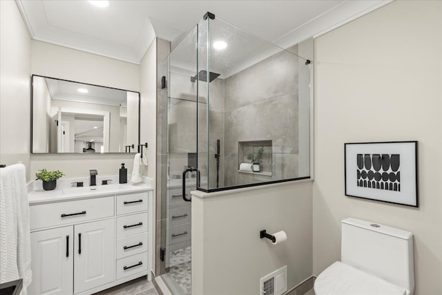 full bath featuring a shower stall, crown molding, vanity, toilet, and recessed lighting