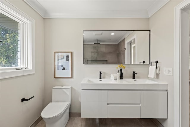 full bath featuring double vanity, baseboards, toilet, a shower, and crown molding