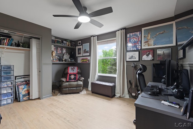 home office featuring ceiling fan and wood finished floors