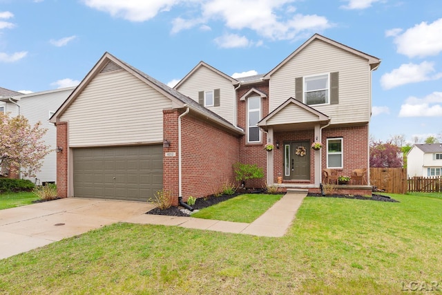 traditional home featuring brick siding, concrete driveway, and an attached garage