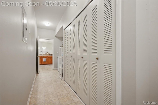 16490 Norfolk Dr, Macomb, MI 48044 - corridor featuring baseboards
