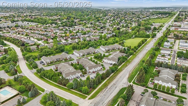 16490 Norfolk Dr, Macomb, MI 48044 - aerial view of property's location featuring nearby suburban area and a highway