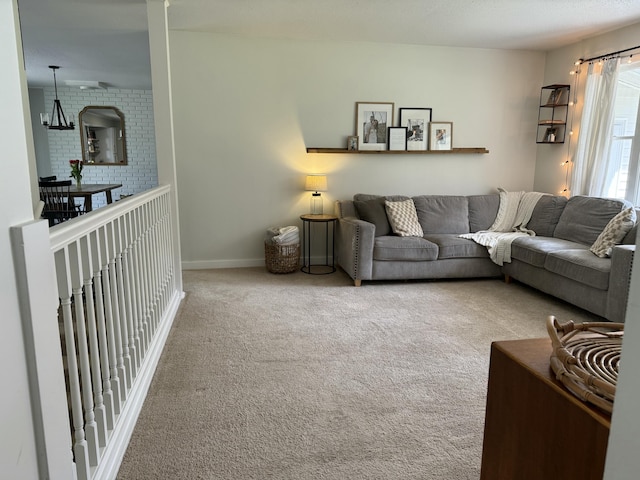 1335 N Sherman Rd, Ludington, MI 49431 - living room with carpet and baseboards