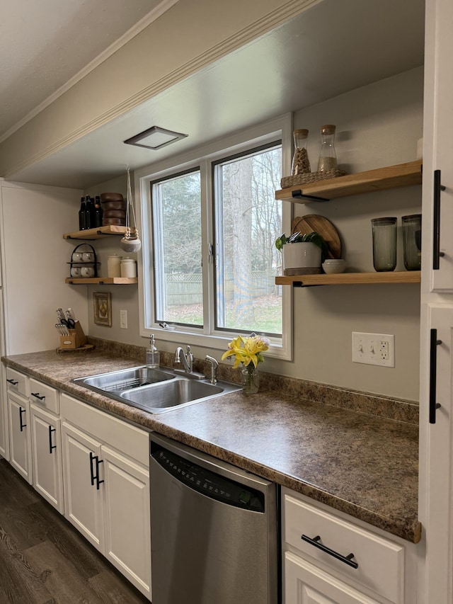 1335 N Sherman Rd, Ludington, MI 49431 - kitchen featuring stainless steel dishwasher, open shelves, a sink, dark wood-style floors, and dark countertops