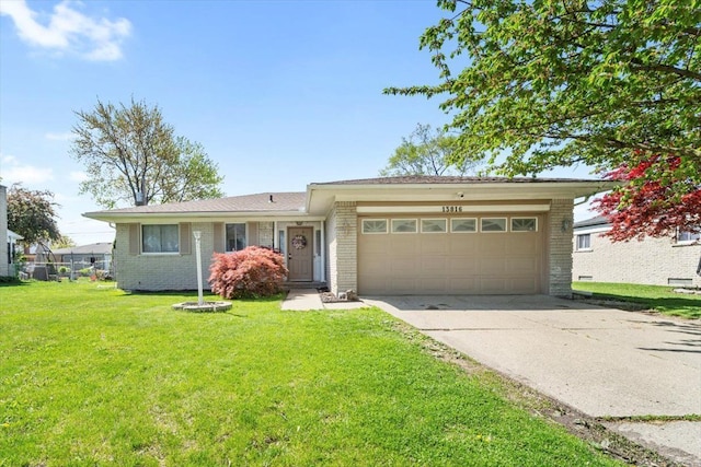 view of front of house featuring an attached garage, brick siding, concrete driveway, and a front yard