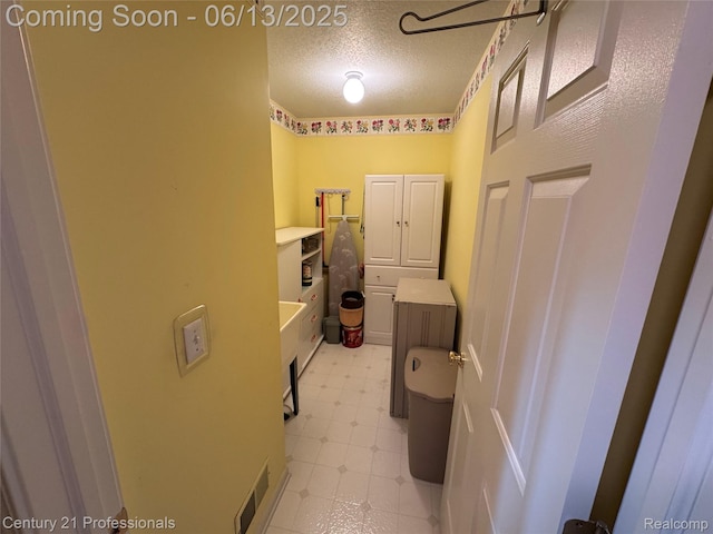 4522 Willow View Ct, Howell, MI 48843 - bathroom featuring tile patterned floors and a textured ceiling