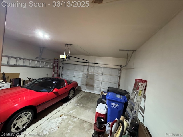 4522 Willow View Ct, Howell, MI 48843 - garage featuring a garage door opener
