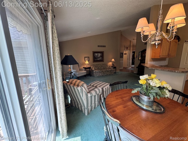 4522 Willow View Ct, Howell, MI 48843 - dining space with carpet flooring, vaulted ceiling, healthy amount of natural light, a chandelier, and a textured ceiling