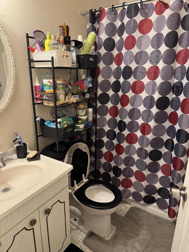 16044 Fairmount Dr, Detroit, MI 48205 - full bathroom with toilet, vanity, curtained shower, and tile patterned flooring