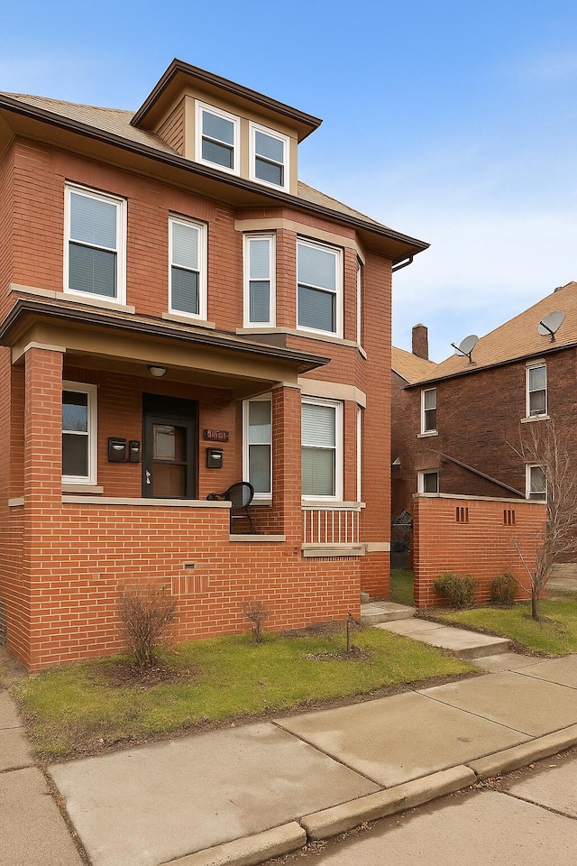 1531 W Warren Ave, Detroit, MI 48208 - view of front of house with brick siding and covered porch