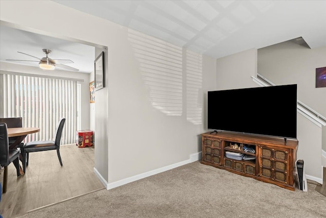 8080 Farnum Ct, Warren, MI 48093 - living room featuring ceiling fan, baseboards, and carpet