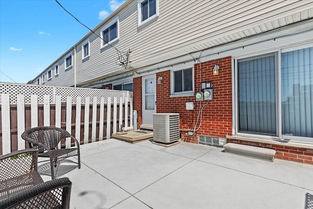 8080 Farnum Ct, Warren, MI 48093 - view of patio / terrace with central AC unit and fence