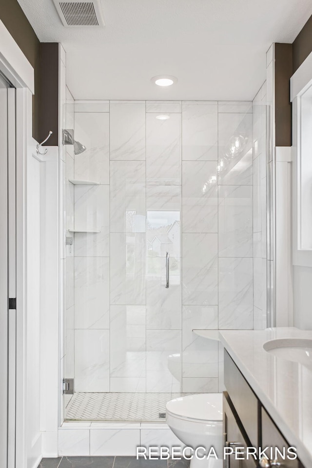 full bath featuring toilet, a stall shower, vanity, and recessed lighting