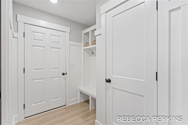 mudroom featuring light wood-style flooring and recessed lighting