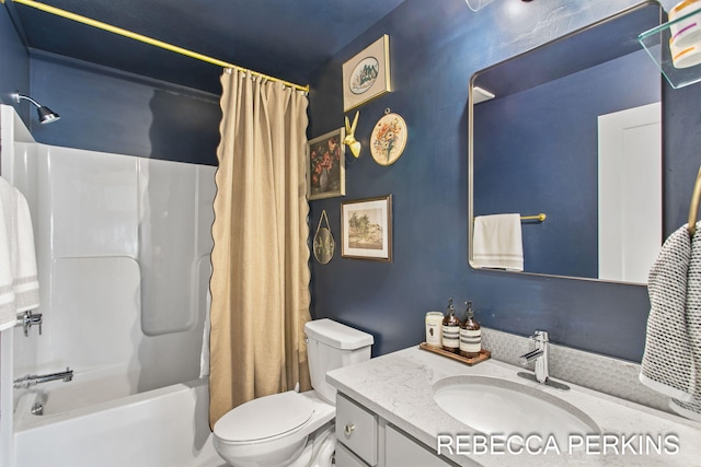 bathroom featuring toilet, vanity, and shower / tub combo with curtain