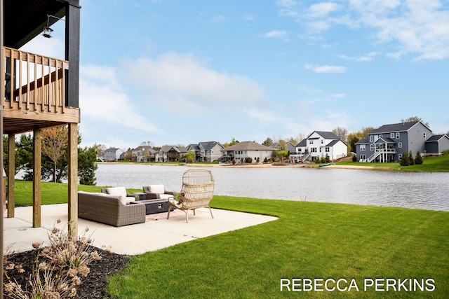view of green lawn with a residential view, a patio, and an outdoor hangout area