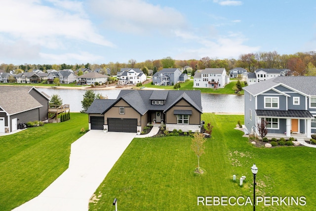 view of front facade featuring a residential view, a water view, and a front lawn