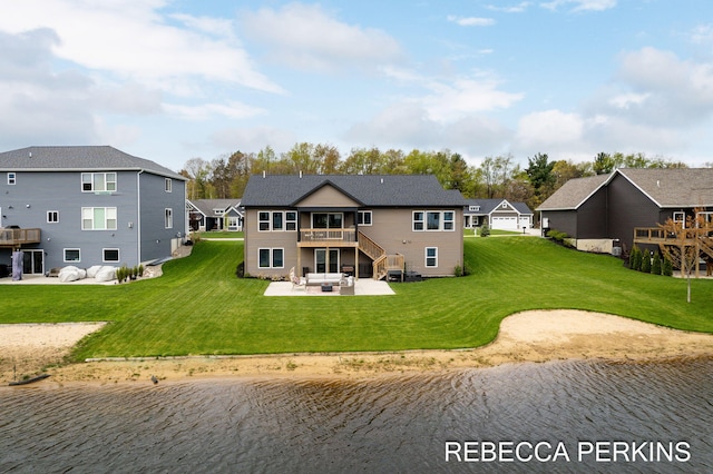 back of house with a patio, a deck with water view, a residential view, a lawn, and an outdoor living space