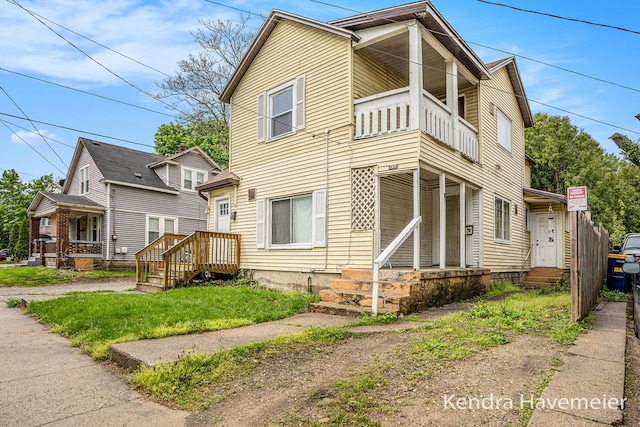 747 Alpine Ave NW, Grand Rapids, MI 49504 - view of front of property with a balcony