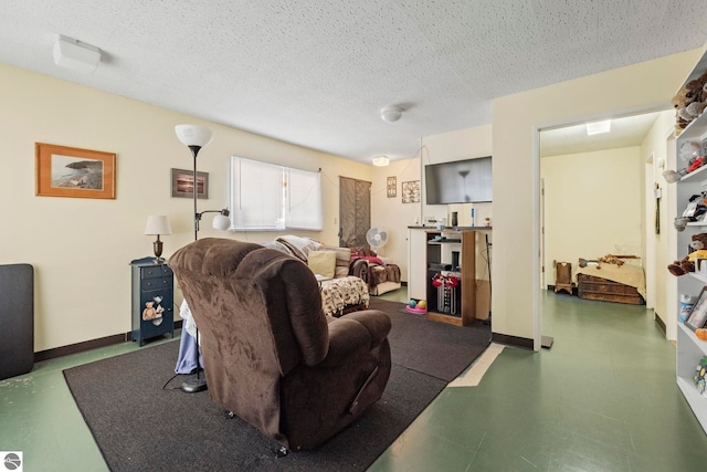 110 W 4th St, Kalkaska, MI 49646 - living area featuring a textured ceiling
