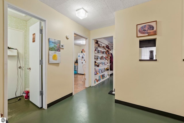 110 W 4th St, Kalkaska, MI 49646 - hallway featuring baseboards