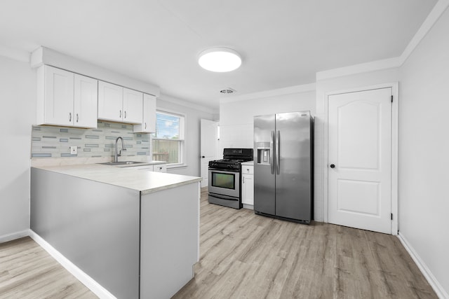 839 E Hayes Ave, Hazel Park, MI 48030 - kitchen with stainless steel appliances, a sink, light wood-style flooring, backsplash, and ornamental molding
