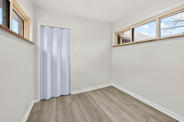 839 E Hayes Ave, Hazel Park, MI 48030 - spare room featuring light wood finished floors and baseboards