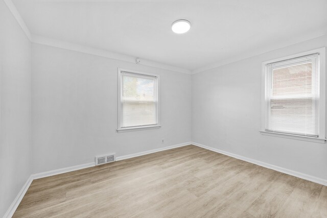 839 E Hayes Ave, Hazel Park, MI 48030 - unfurnished room featuring wood finished floors, ornamental molding, and baseboards