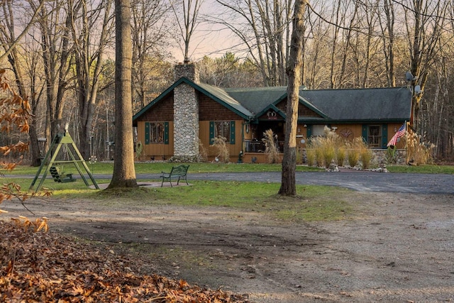 view of front of house with a chimney