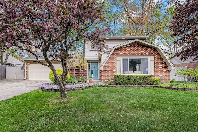 view of front facade featuring concrete driveway, a garage, and brick siding