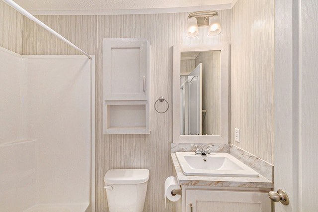 13780 Alaska Ave, Eagle, MI 48822 - bathroom featuring a shower, toilet, and vanity