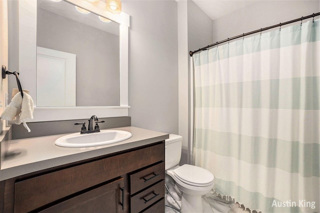6526 Alward Dr, Hudsonville, MI 49426 - bathroom with toilet, vanity, and a shower with shower curtain