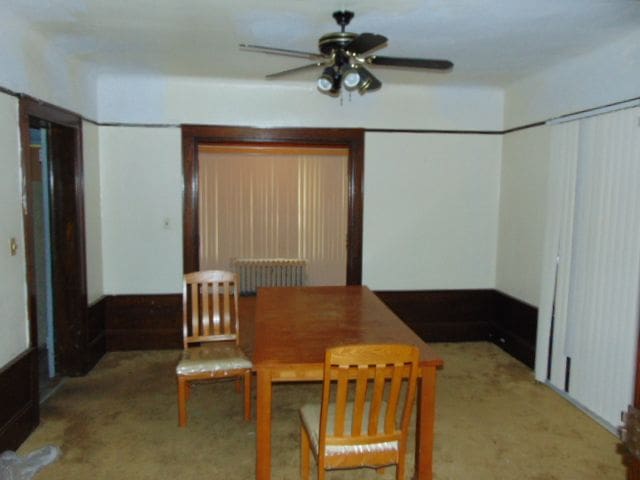 50 Glendale St, Highland Park, MI 48203 - dining area featuring radiator, carpet flooring, and ceiling fan