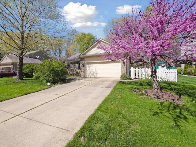view of front of house with an attached garage, driveway, and brick siding