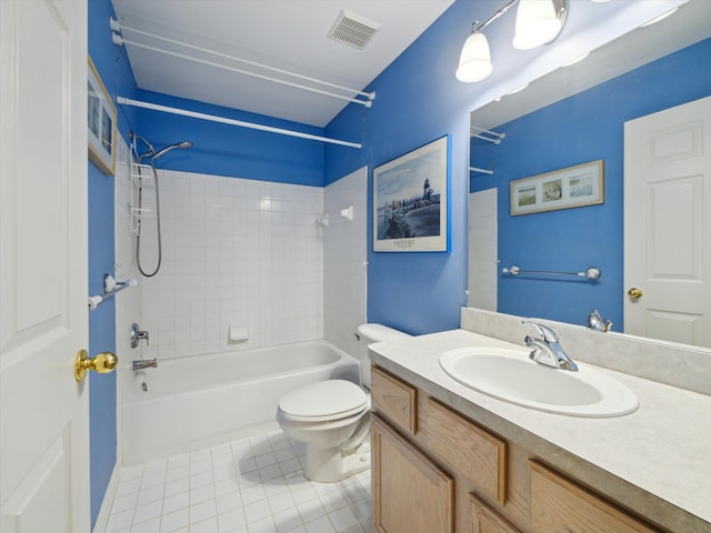 full bathroom featuring  shower combination, tile patterned floors, toilet, and vanity