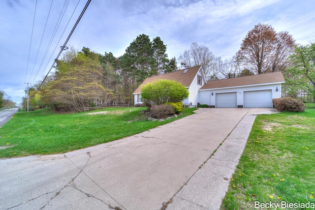 823 Warner St, Whitehall, MI 49461 - view of home's exterior with a yard and concrete driveway