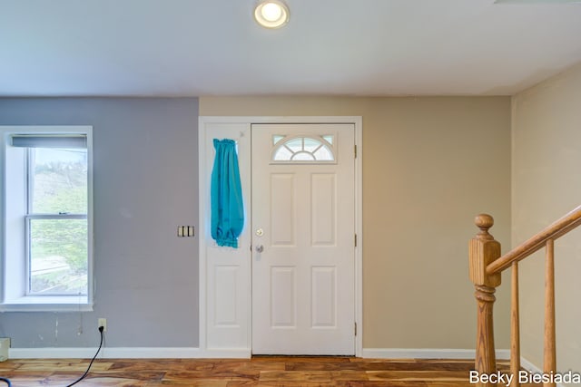 823 Warner St, Whitehall, MI 49461 - entrance foyer featuring baseboards and wood finished floors