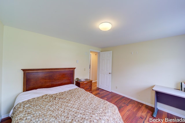 823 Warner St, Whitehall, MI 49461 - bedroom with wood finished floors and baseboards