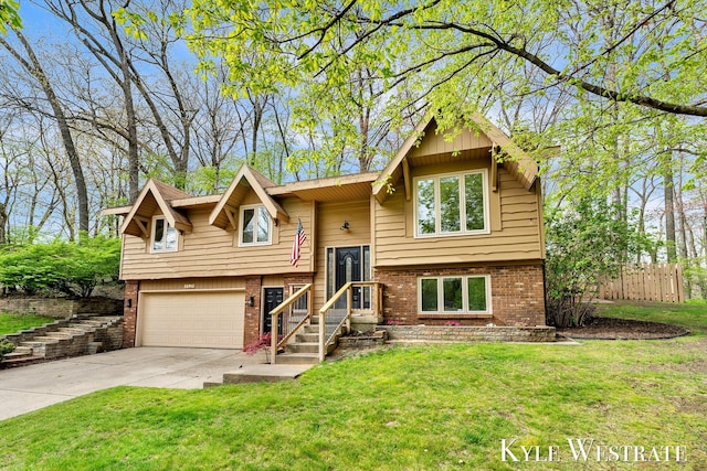 bi-level home featuring brick siding, concrete driveway, and a garage