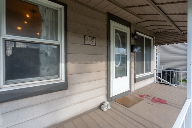 wooden terrace featuring a porch