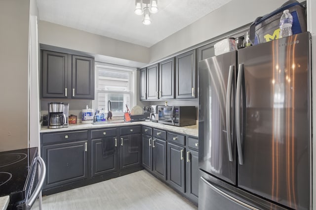kitchen with stainless steel appliances and a sink