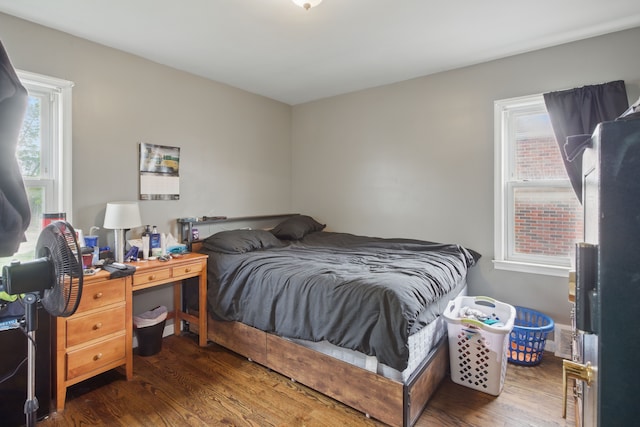 bedroom with wood finished floors