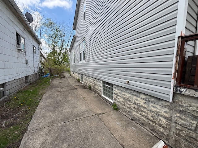 17233 Fenelon St, Hamtramck, MI 48212 - view of home's exterior featuring a patio