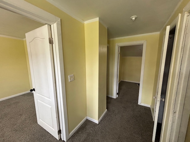 17233 Fenelon St, Hamtramck, MI 48212 - corridor with dark colored carpet, baseboards, and ornamental molding