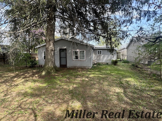 7755 Woodland Rd, Lake Odessa, MI 48849 - back of property featuring fence