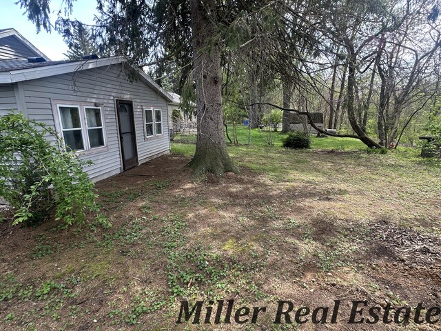 7755 Woodland Rd, Lake Odessa, MI 48849 - view of yard