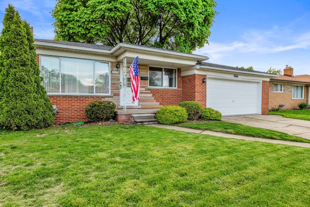 24719 Audrey Ave, Warren, MI 48091 - ranch-style house featuring brick siding, a garage, driveway, and a front yard